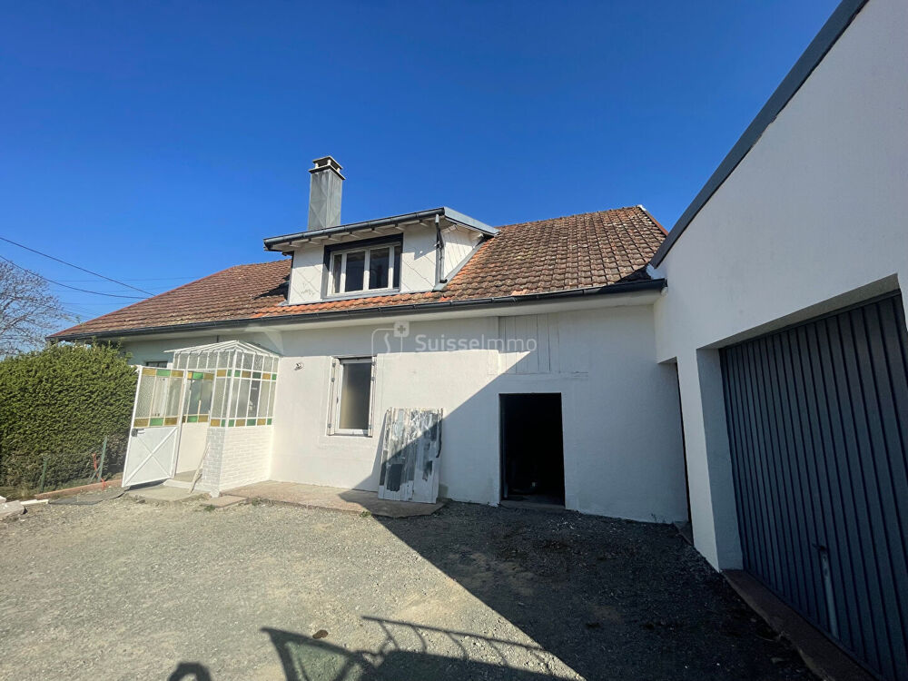 Maison à rénover sur 10 ares de terrain clos et arboré