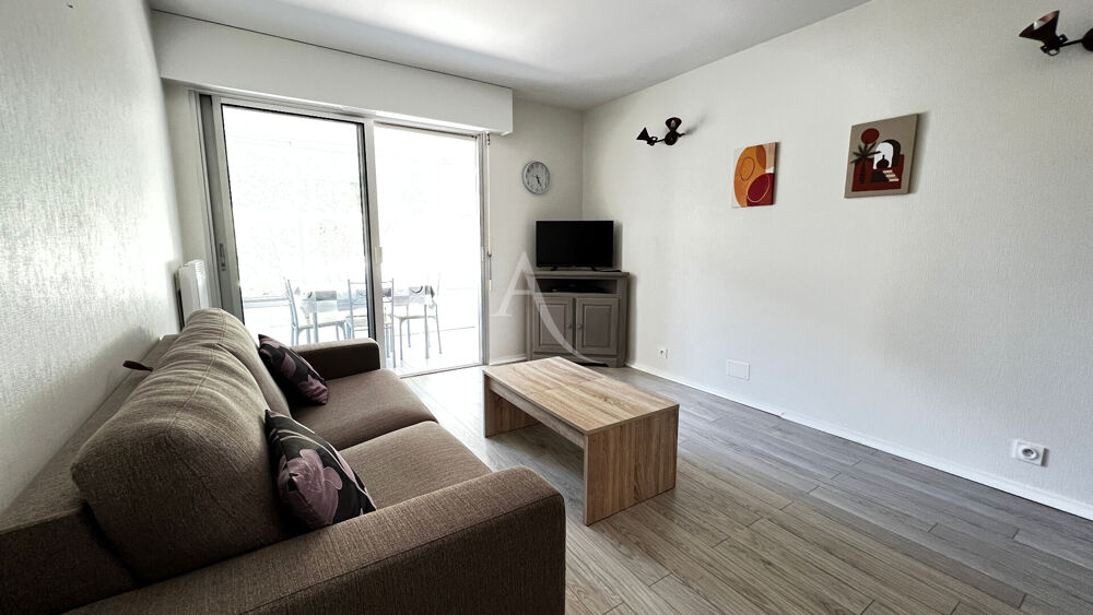 Appartement proche plage et commerces avec garage et loggia