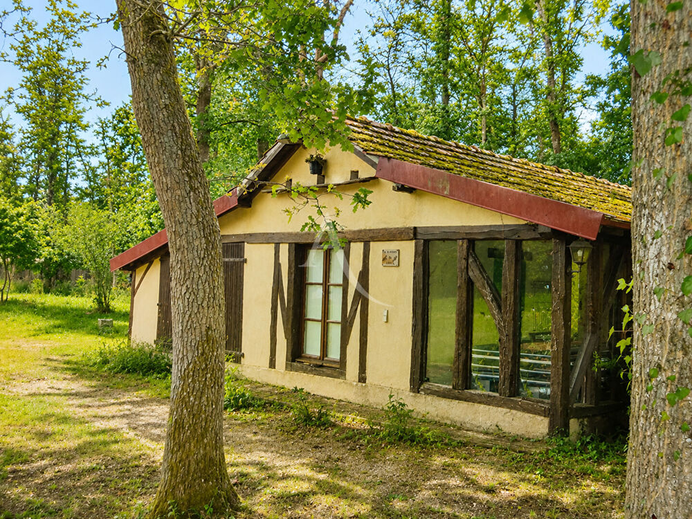 Propriété familiale neuve avec dépendance