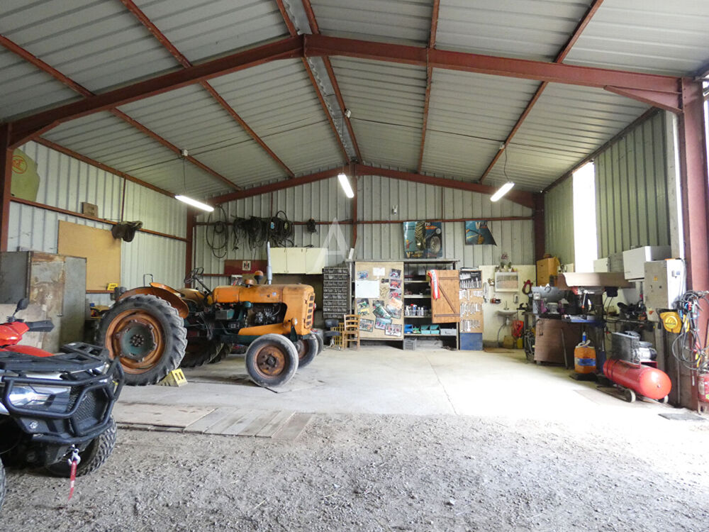 Terrain de 1 000 m² avec Mobil home, 2 hangars Outarville