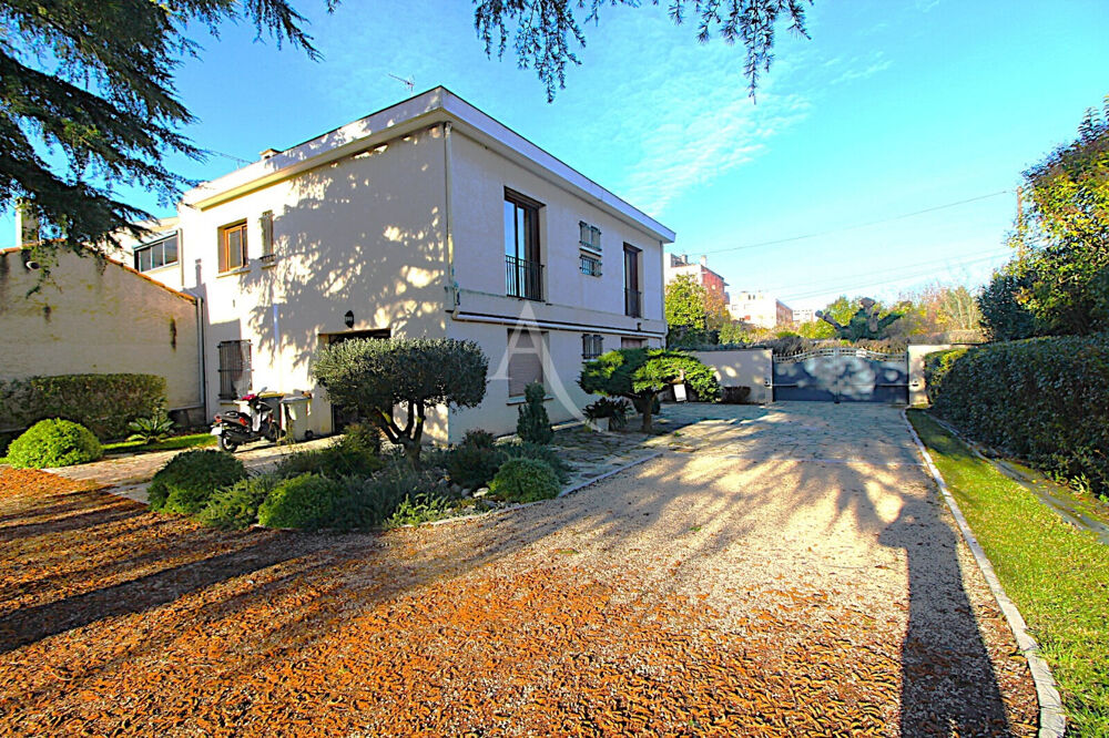 Maison d'exception en coeur de ville 400 m² habitables sur un parc de 1 200 m²