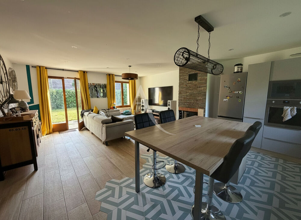 Maison individuelle avec jardin et sous-sol complet