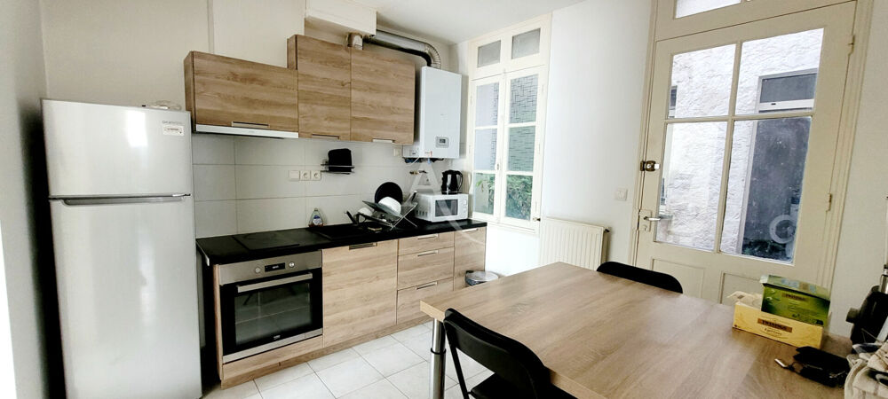 Appartement Saintes et local commercial 78m²