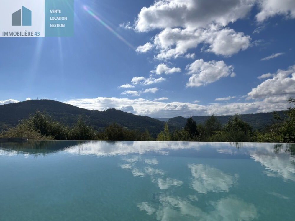 Maison d'architecte avec piscine à débordement +vue exceptionnelle