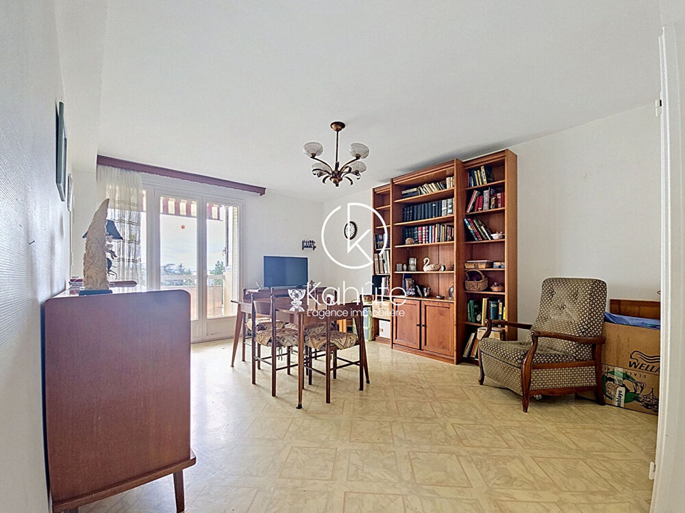 Appartement T3, 57 m2, commerces, écoles, bus à pied, ascenseur , balcon orienté sud ouest, stationnement