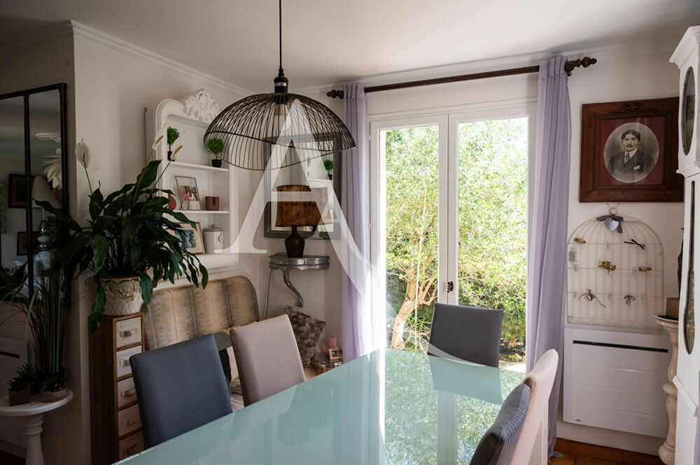 Maison de charme avec jardin, garage et terrasse aménagée proche Carcassonne