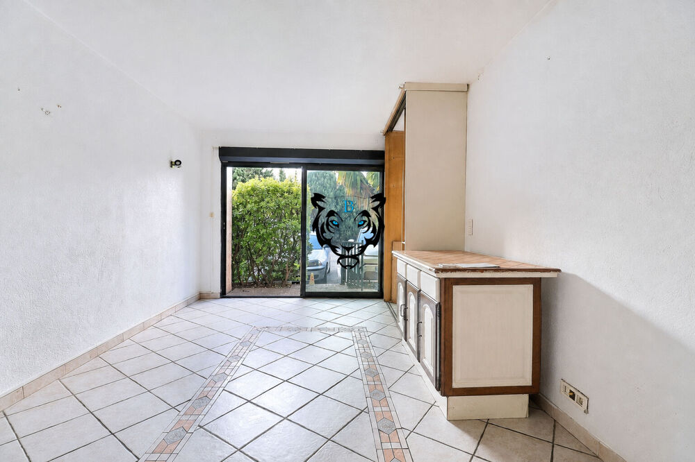 Studio rez de chaussée - terrasse - parking - cave - 26.37 m2