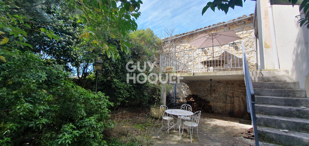 Maison d'exception avec garages, cave, local indépendant et parc arboré