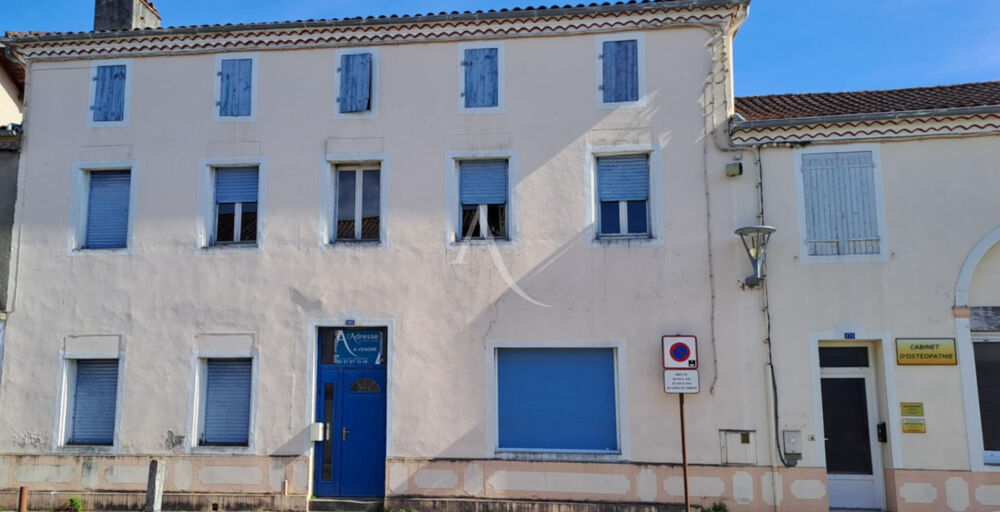 Maison de ville + T3 + local commercial