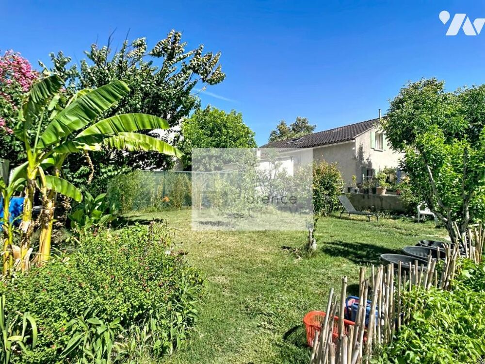 Ensemble immobilier composé de deux habitations, un hangar ainsi que du terrain à bâtir