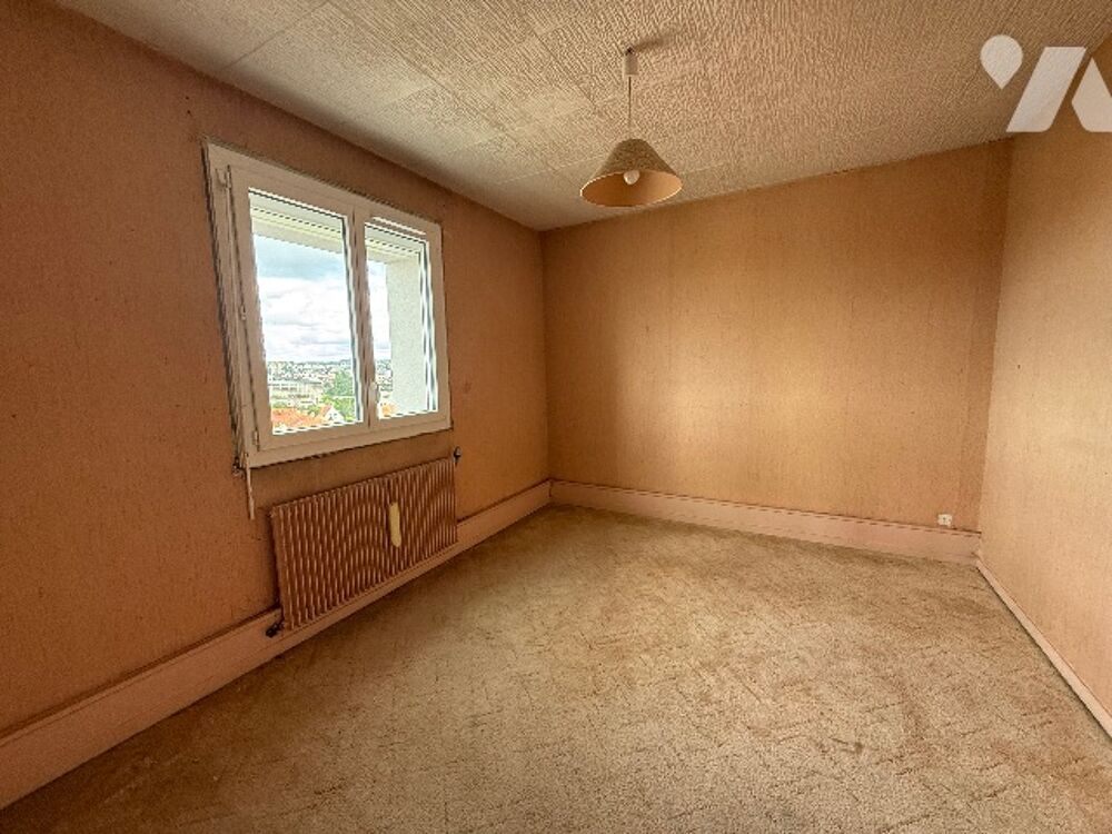 Appartement à Dijon de 67,58 m² comprenant quatre pièces dont deux chambres.