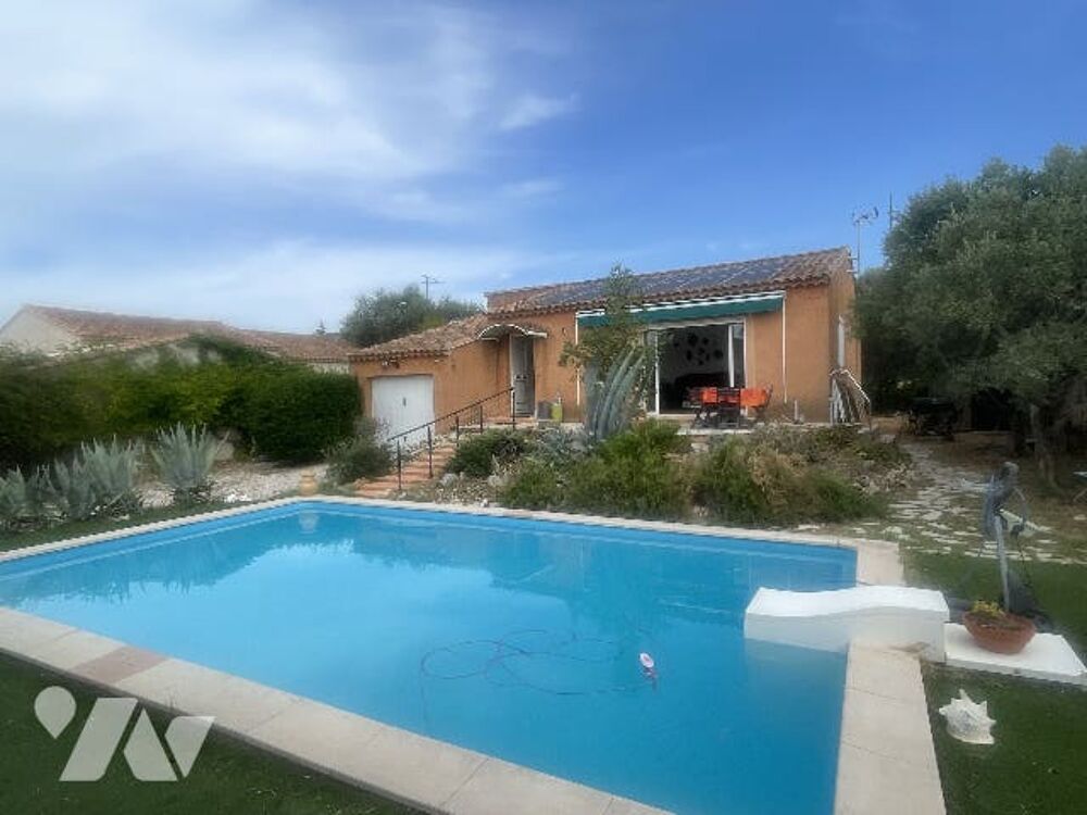 Maison de plain pied 3 / 4 pièces avec garage et piscine.