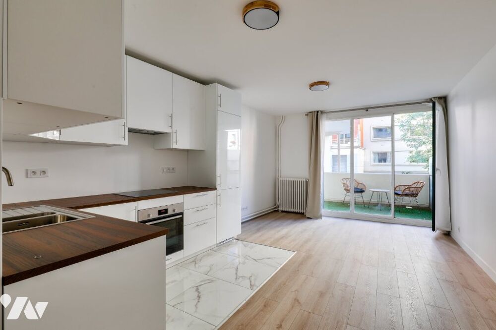 Vente Appartement Au 1er étage, avec ascenseur, appartement de 2/3 pièces de 48,49 m², terrasse de 7,72 m². Bon état. Paris 15