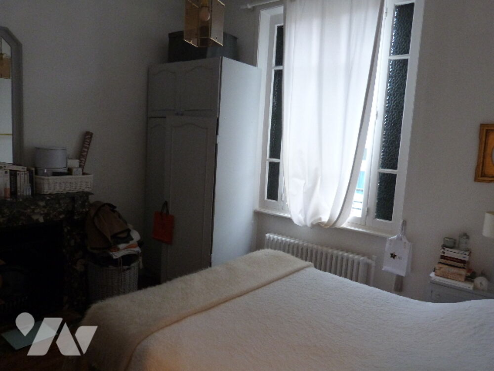 Maison individuelle avec jardin... Vente avec locataires en place....