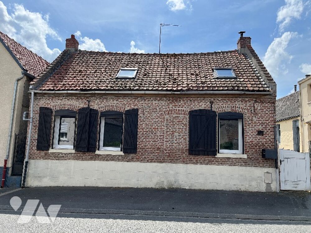 Maison avec cour et garage