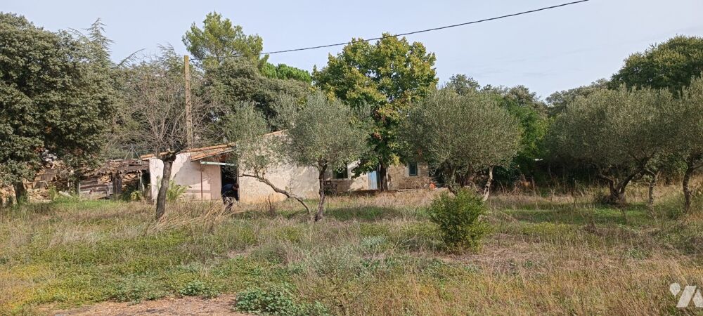 "mazet" en très mauvais état à rénover sur terrain de 2044 m2 zone LH du PLU de la ville de NIMES.