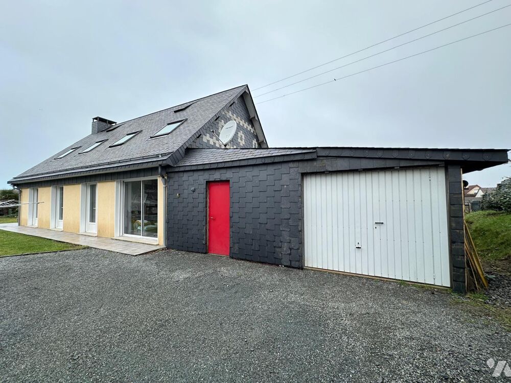 une propriété composée d'une maison et une dépendance