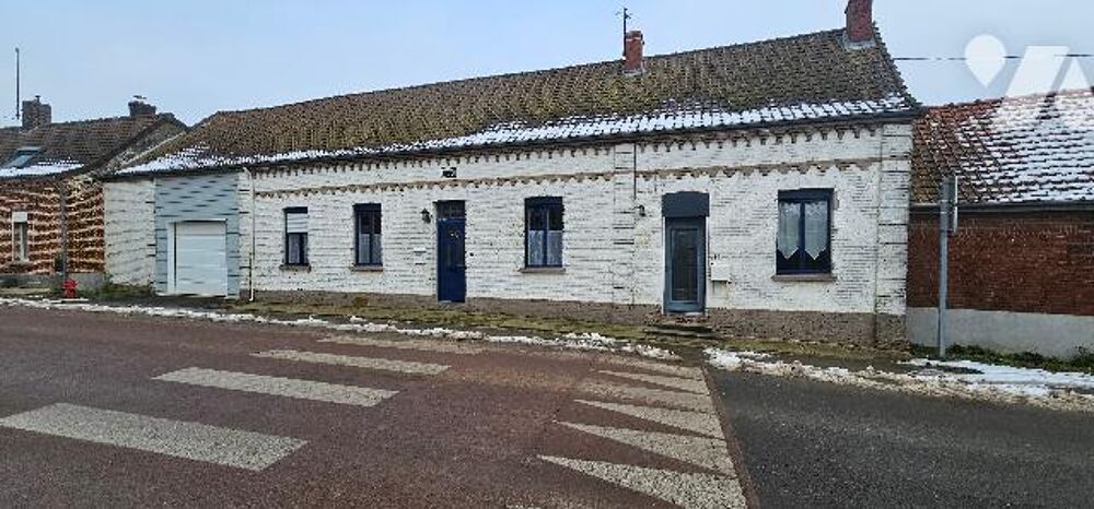Maison mitoyenne comprenant 2 logements bâtie sur une parcelle de 2183m².