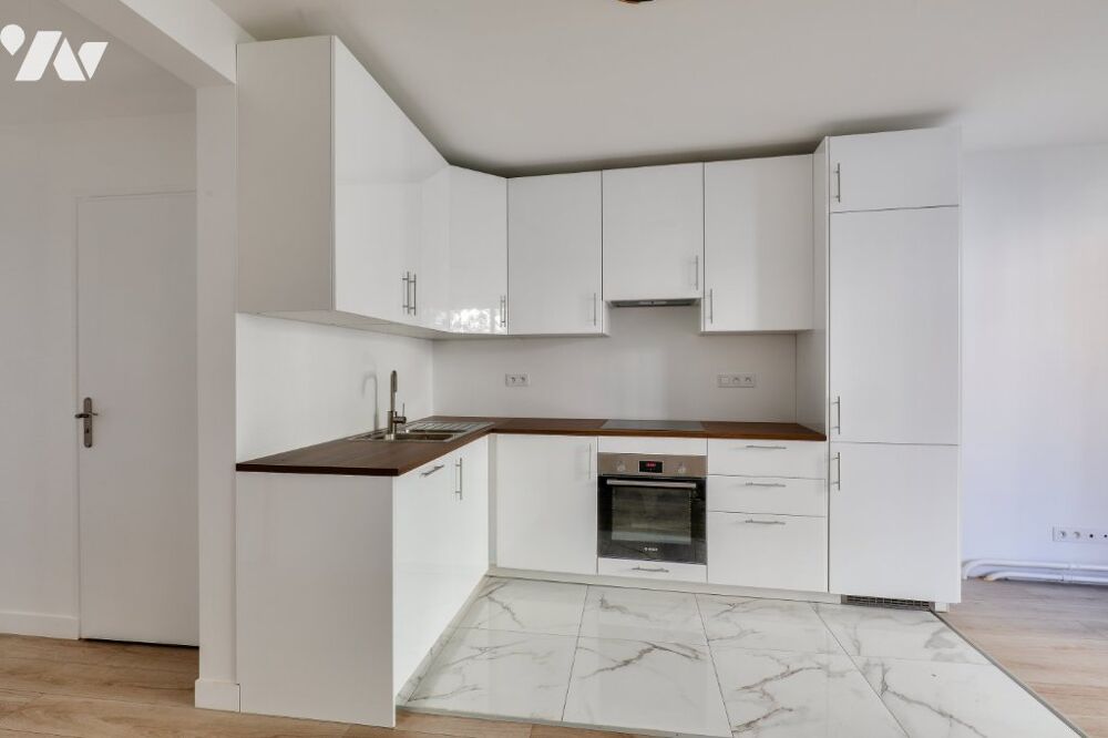 Vente Appartement Au 1er étage, avec ascenseur, appartement de 2/3 pièces de 48,49 m², terrasse de 7,72 m². Bon état. Paris 15
