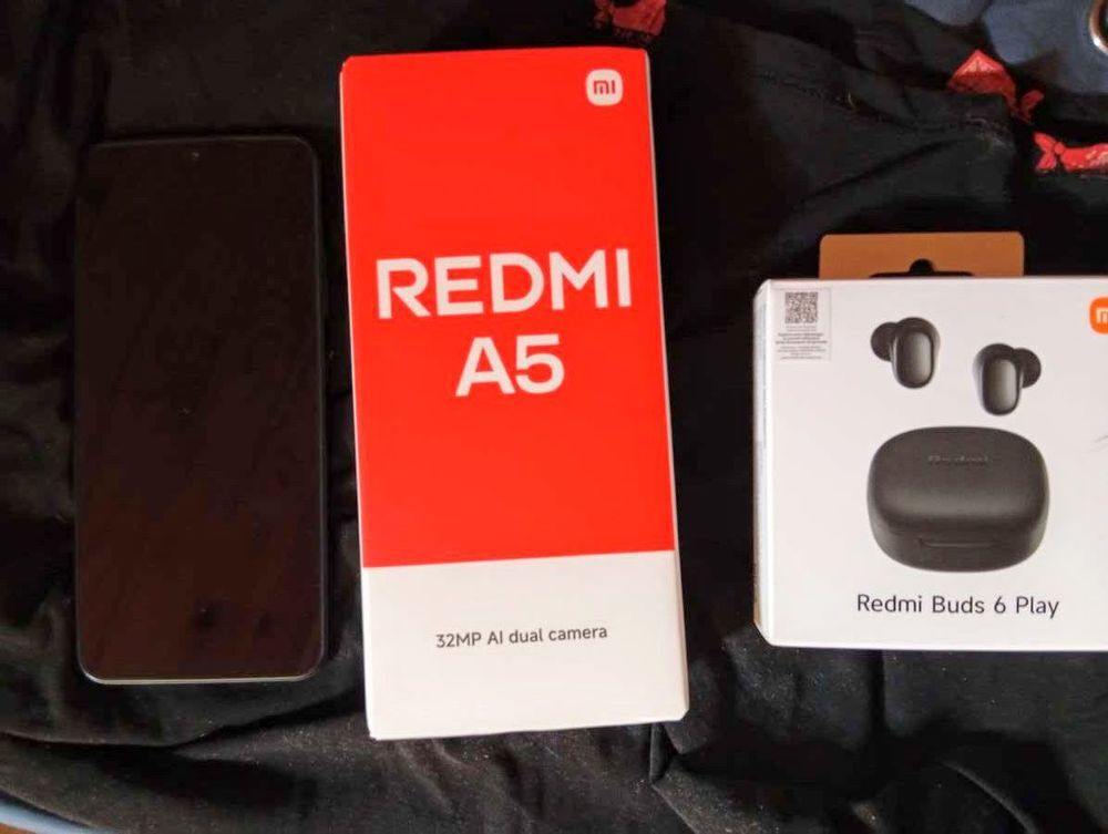 Redmi A5 128 go neuf + &eacute;couteurs buds play 6 Téléphones et tablettes