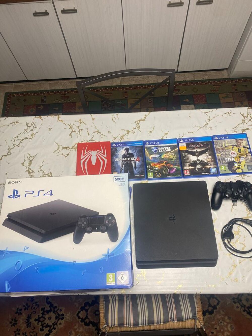 PS4 Slim + 5 jeux + manette Jeux / jouets