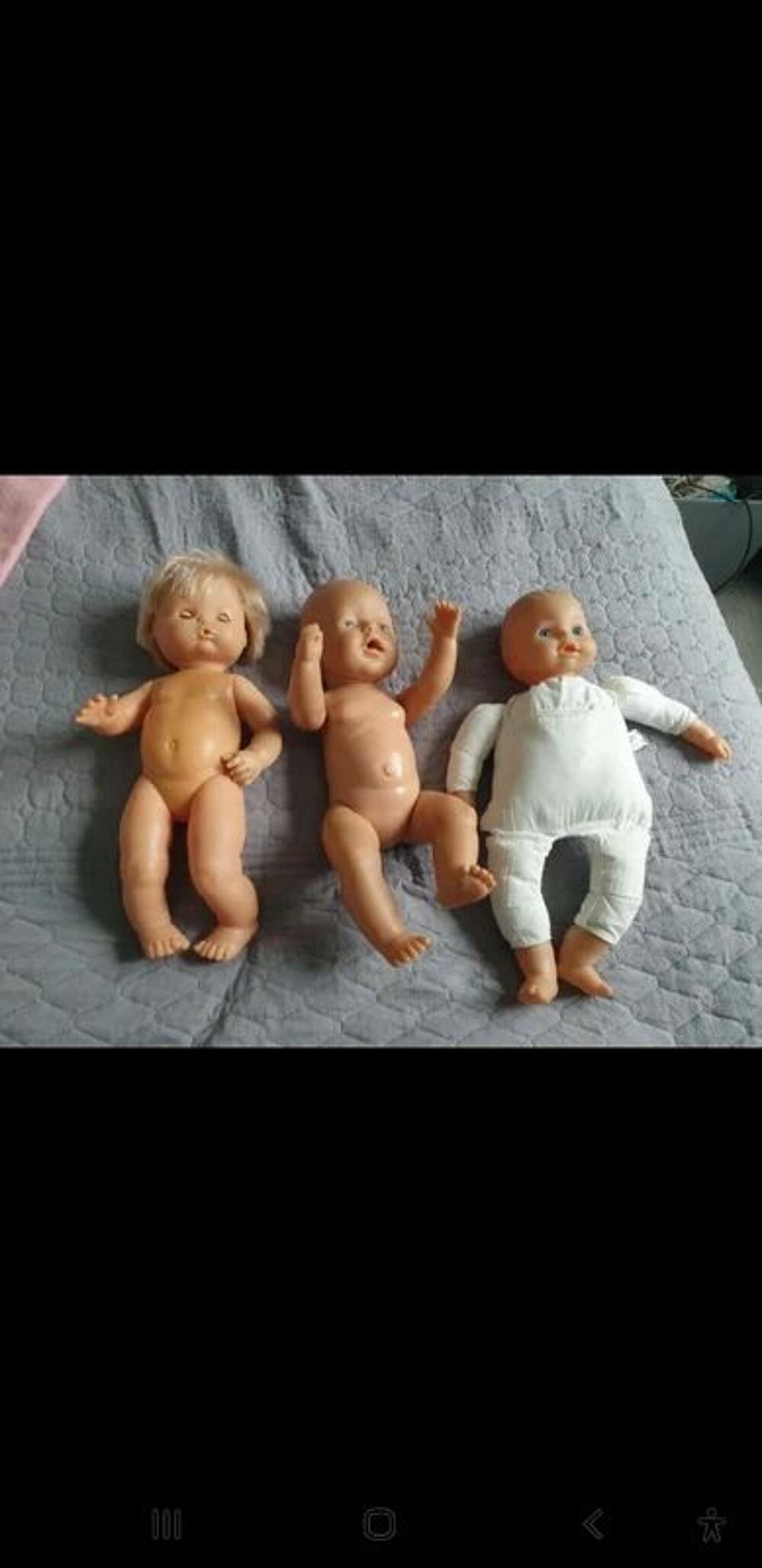 3 poupons et leurs v&ecirc;tements
Jeux / jouets