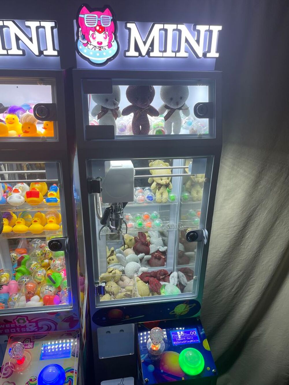 Machine &agrave; pince attrape peluche Jeux / jouets