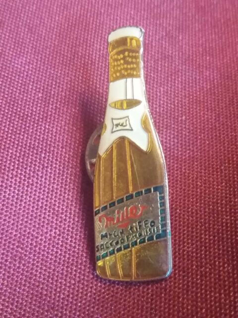 Pin's bouteille mille 2 Avermes (03)