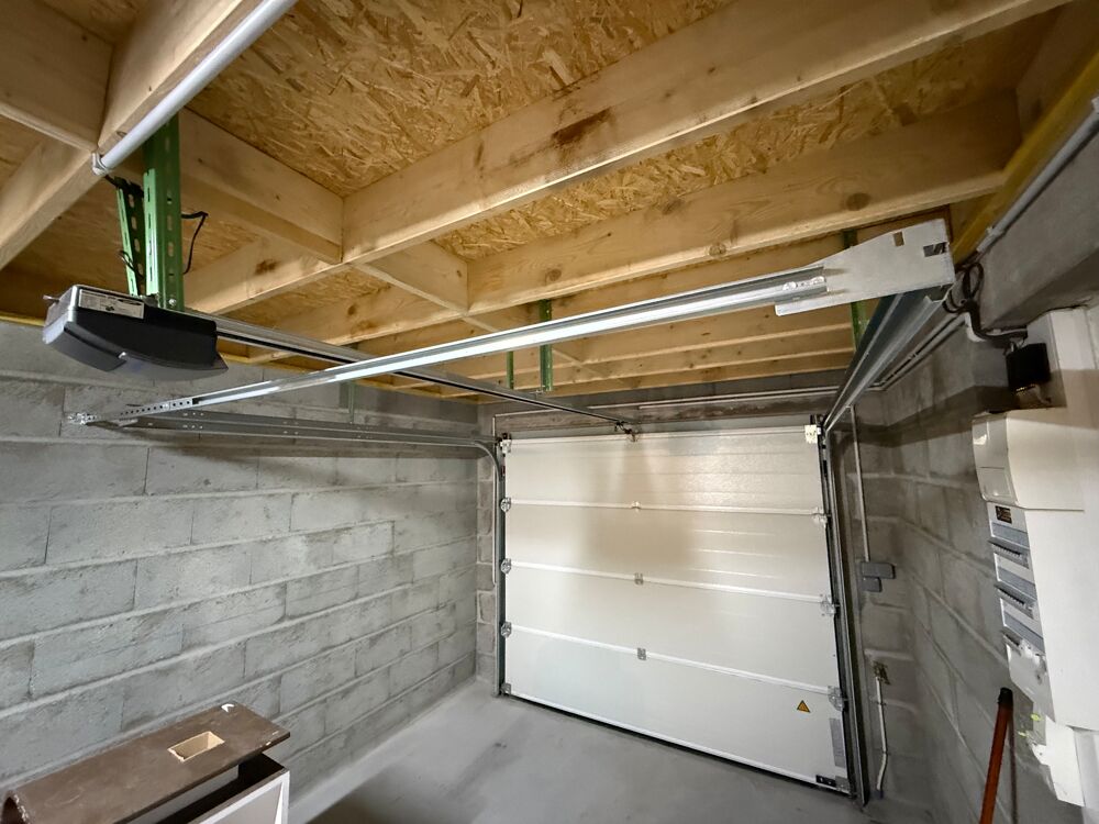 Portail sectionnel + moteur Novoferm Bricolage