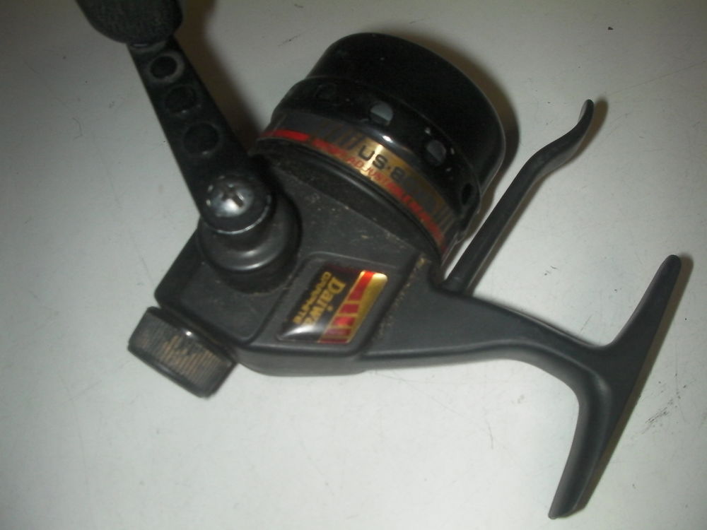 Moulinet lancer DAIWA capot&eacute; graphite Sports