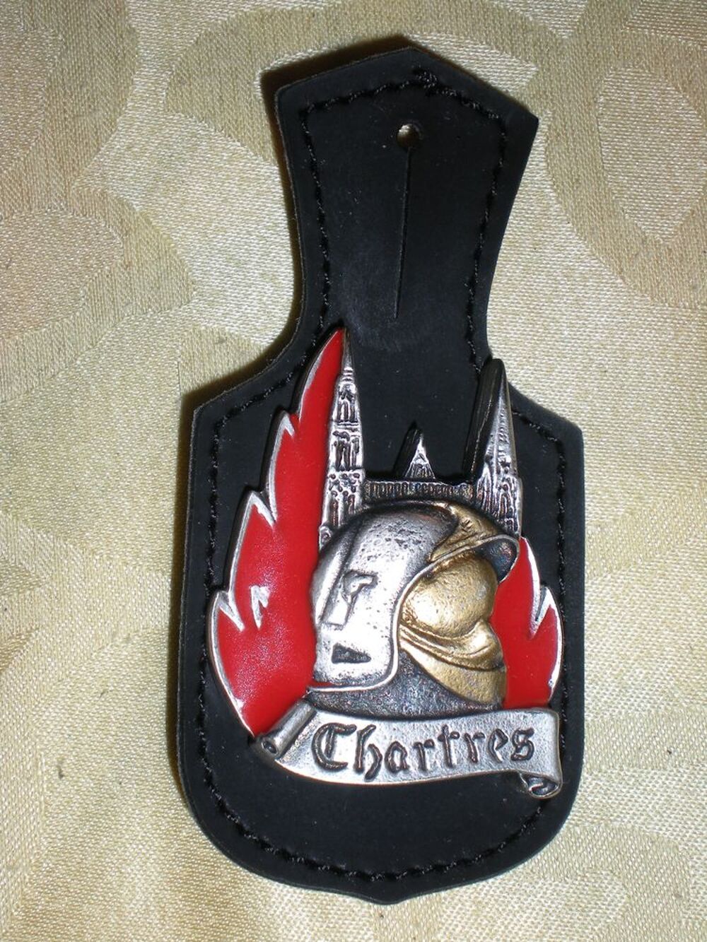 Pucelle ou Insigne des pompiers de Chartres 