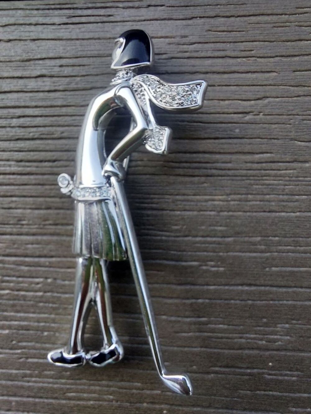  Broche golfeuse en rodhium, Bijoux et montres