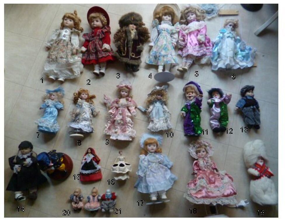 poup&eacute;es en porcelaine de tailles diverses Jeux / jouets