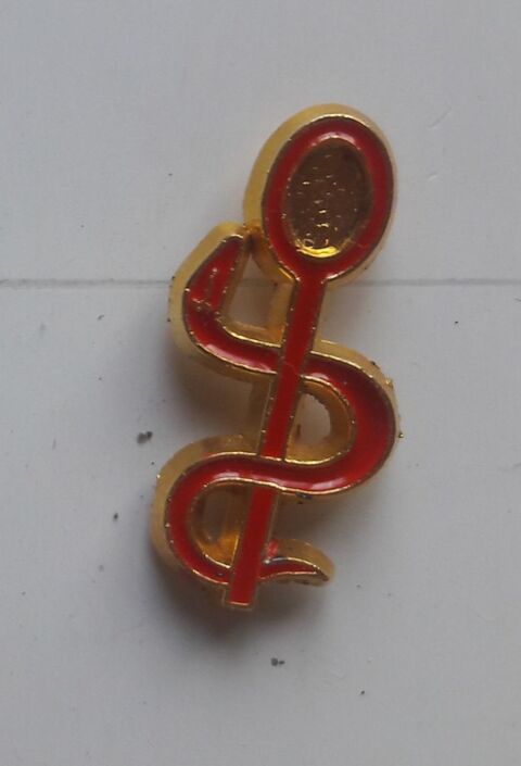 Pin's  Infirmire  rouge et dor
2 Boulogne-Billancourt (92)