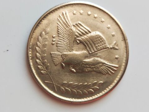 une pièce des usa      UNITE COMMERCIALE      en argent . 50 Dolus-d'Oléron (17)
