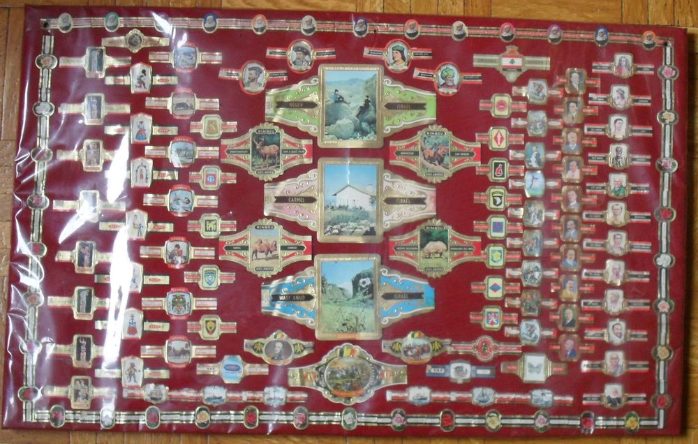 Tableau de 140 bagues de cigare de diff&eacute;rentes tailles. 