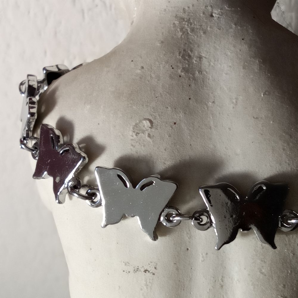 Joli bracelet avec papillons en nacre abalone Bijoux et montres