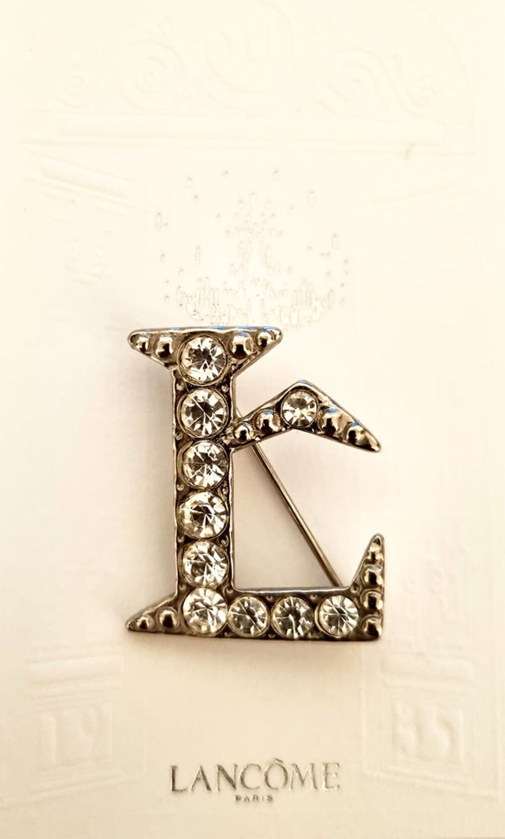 Tr&egrave;s belle broche Lanc&ocirc;me avec strass, rare Bijoux et montres