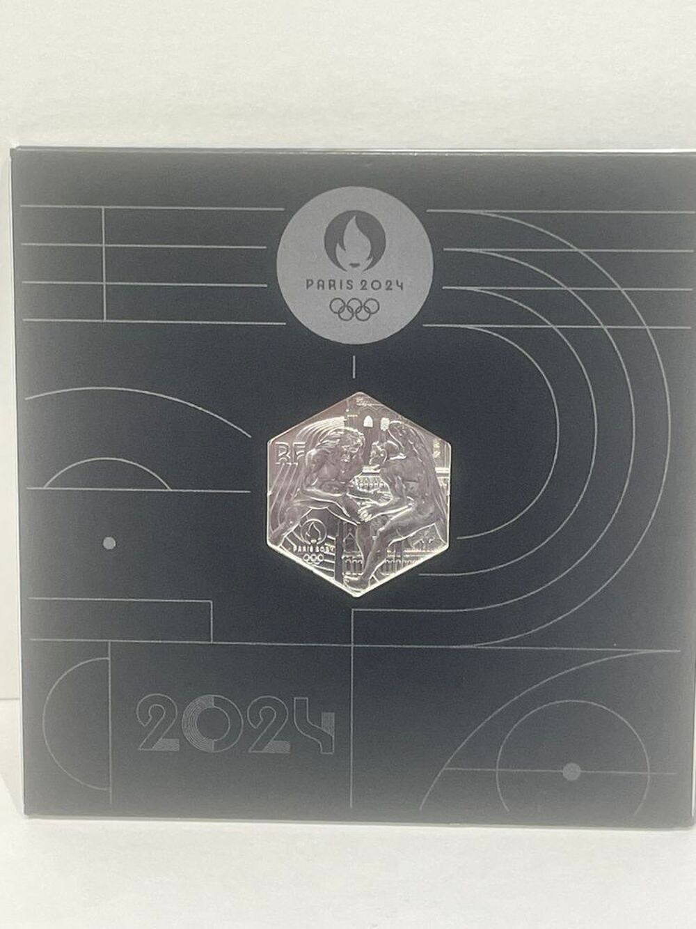 Pi&egrave;ce argent hexagonale de 10e JO PARIS 2024 Hercule 