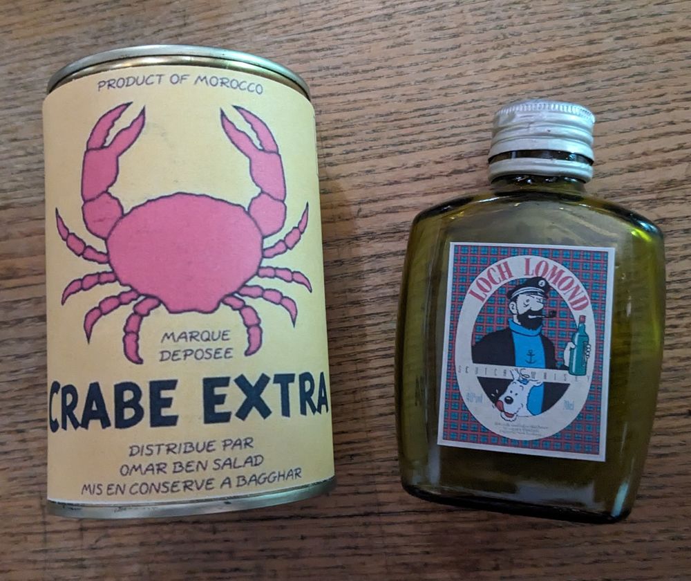 tintin et Milou bo&icirc;te de conserve plus bouteille du capitain Electroménager