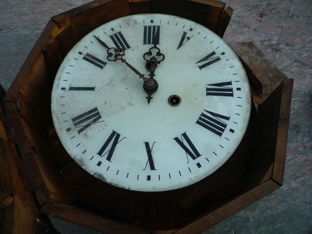 Oeil de boeuf / pendule (G) 