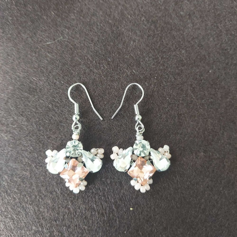 Boucle d'oreille Bijoux et montres