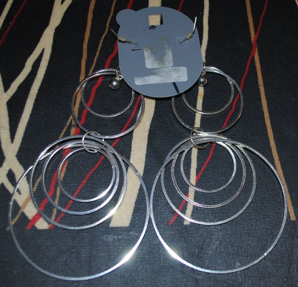Boucles d'oreilles modernes anneaux mobiles Bijoux et montres