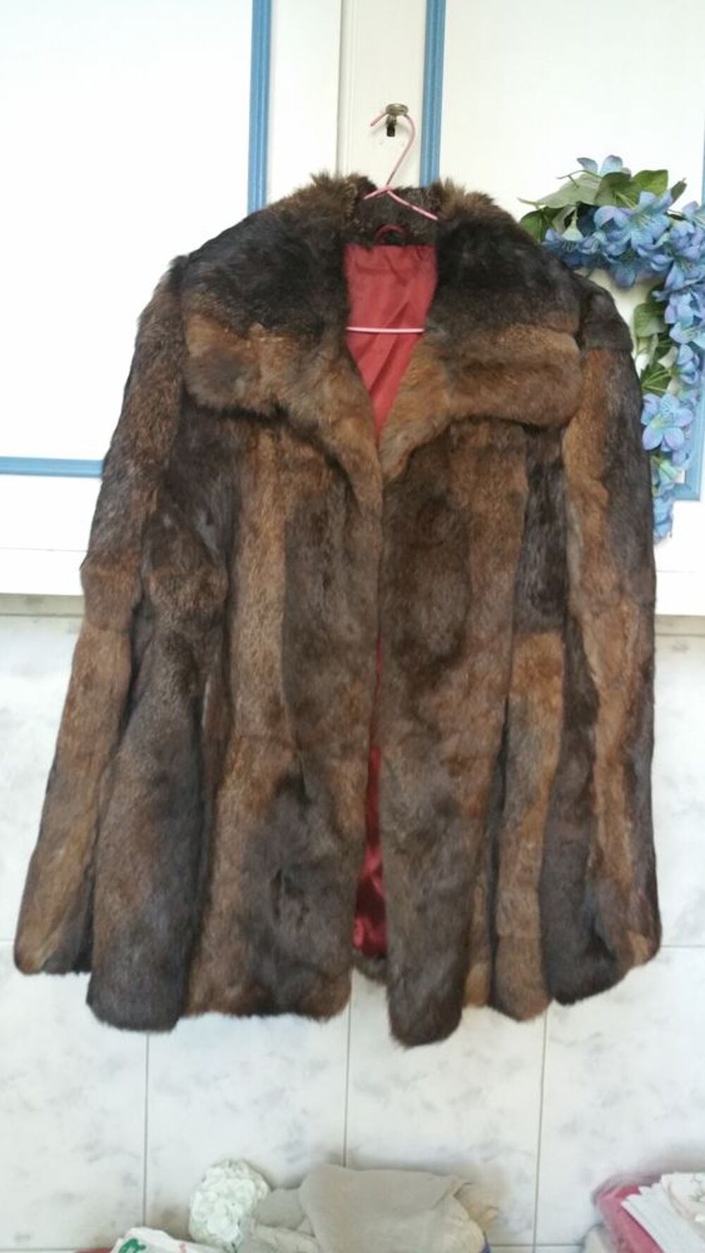 veste fourrure quasi neuve Vêtements