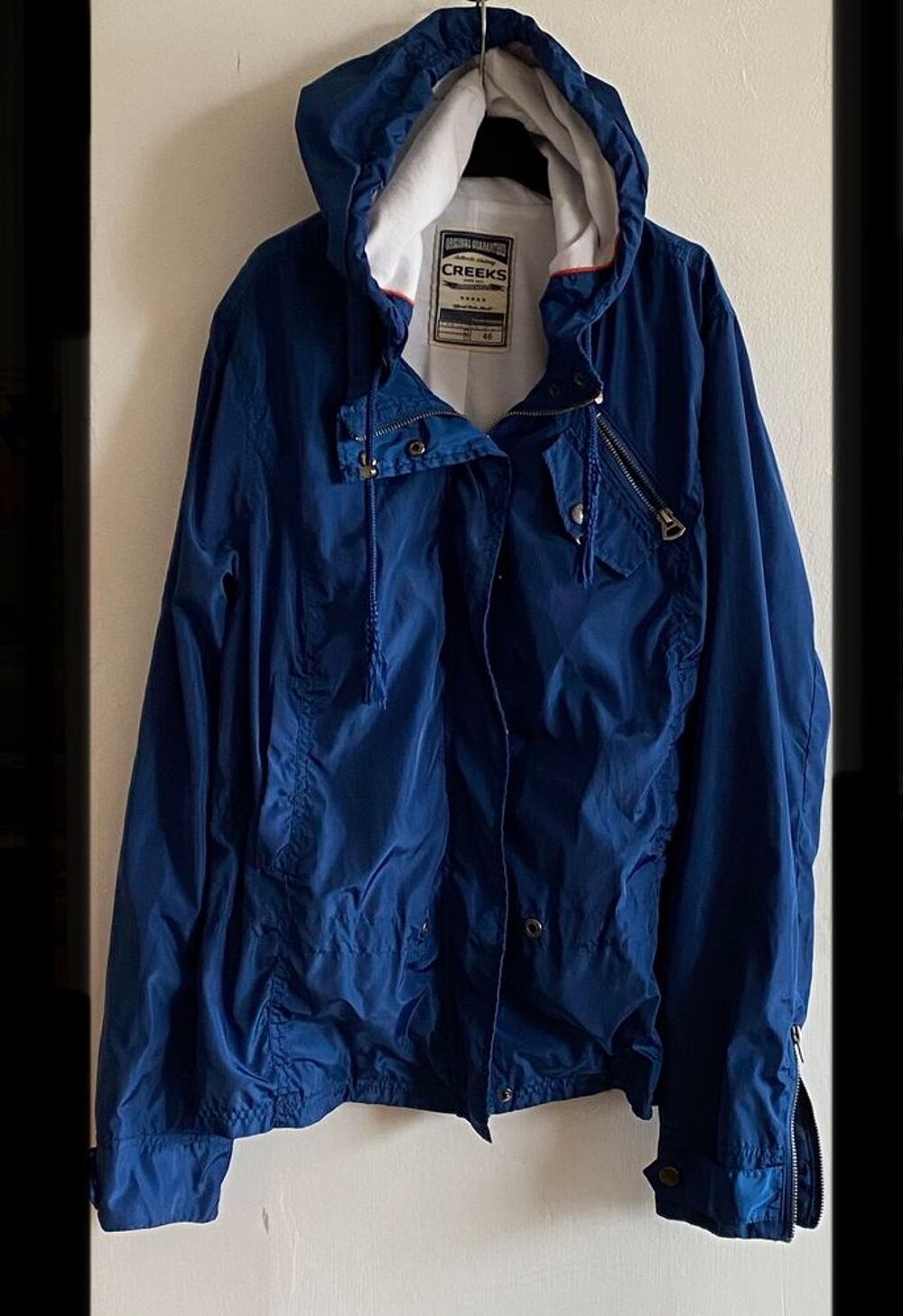 Imperm&eacute;able bleu avec capuche Creeks Taille : 46 Vêtements