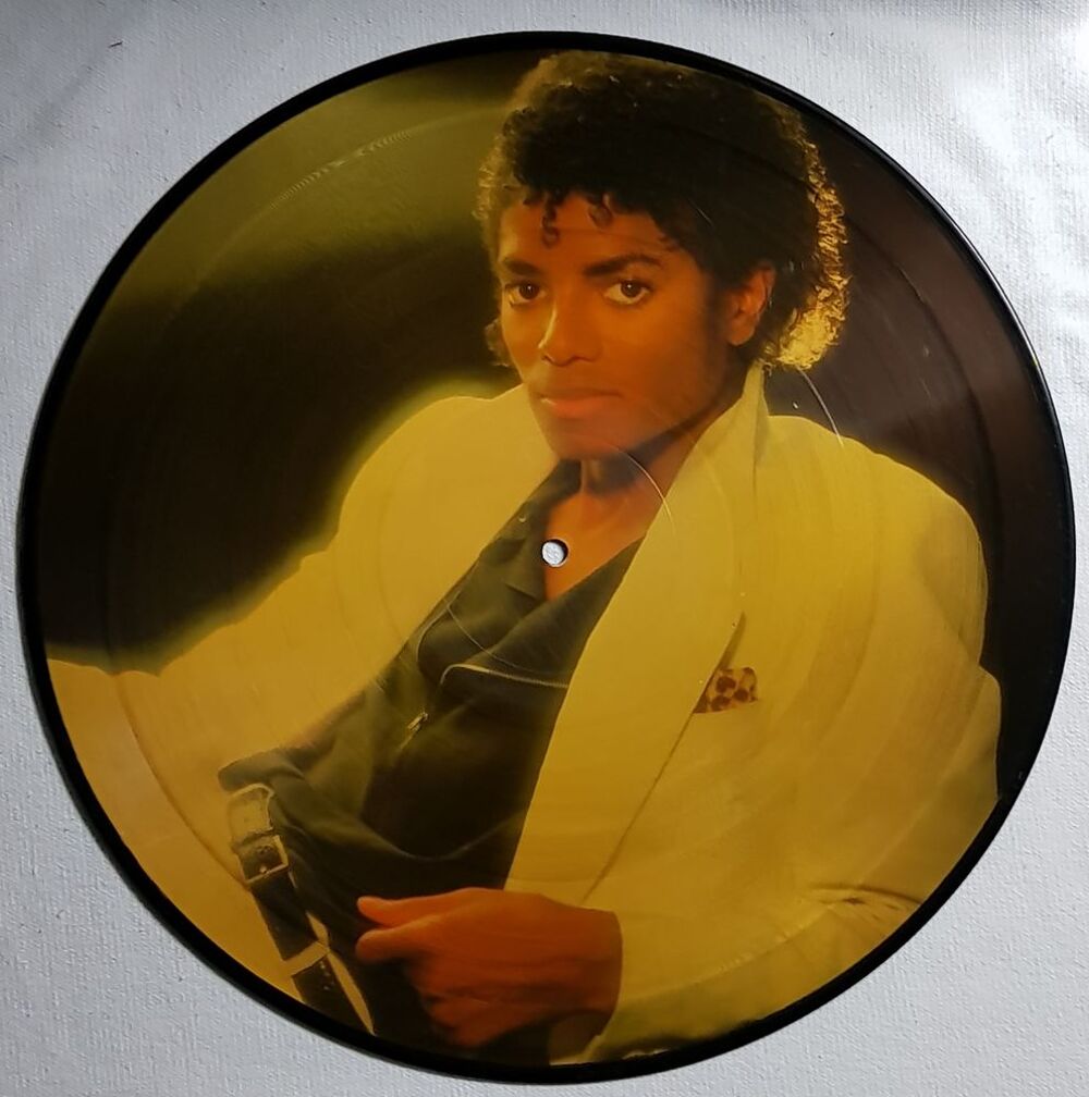 MICHAEL JACKSON Sign&eacute; - LP THRILLER EO 1982 + picture disc CD et vinyles