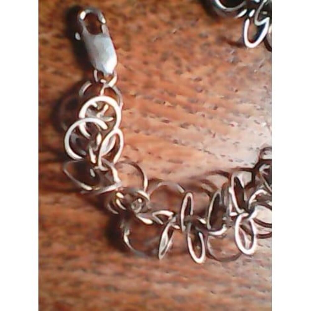 Bracelet anneaux entrem&ecirc;l&eacute;s en acier Bijoux et montres