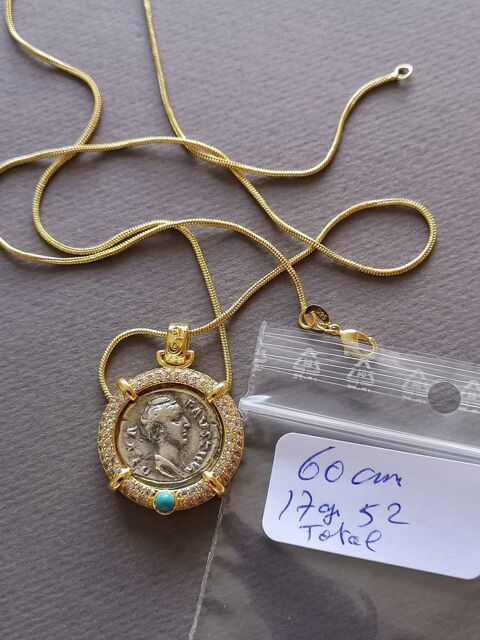 collier plus mdaillon mtal commun dor la pice est argente c'est une pice avec une femme 45 Saint-Pierre (97)