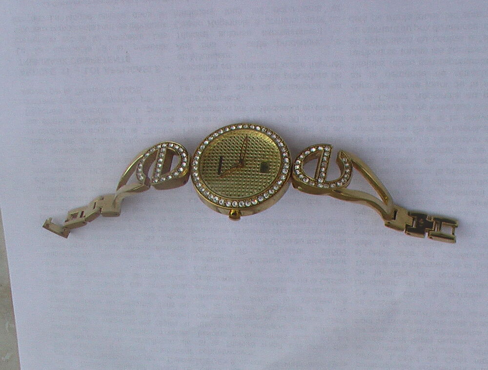 montre femme elite boitier et bracelet plaqu&eacute; jaune 
Bijoux et montres