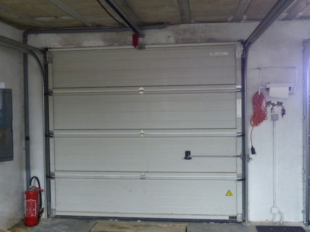 Portail de garage sectionnel motorise Bricolage